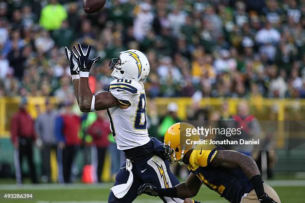 Malcom Floyd of the San Diego Chargers receives a 50 yard pass in the third quarter against the Green Bay Packers at Lambeau Field on October 18,...