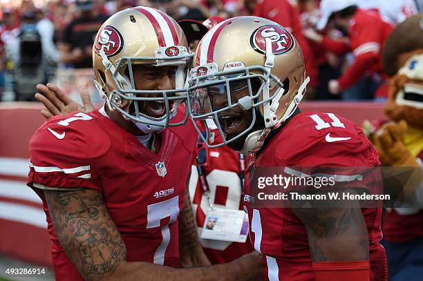 Quarterback Colin Kaepernick and wide receiver Quinton Patton of the San Francisco 49ers celebrate after a 21-yard touchdown pass against the...