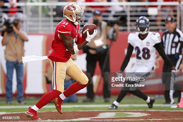 Wide receiver Quinton Patton of the San Francisco 49ers makes a 21-yard touchdown catch against the Baltimore Ravens during their NFL game at Levi's...