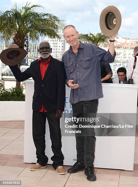 Actor Peter Djigirr and director Rolf De Heer attend the "Charlie's Country" photocall at the 67th Annual Cannes Film Festival on May 22, 2014 in...