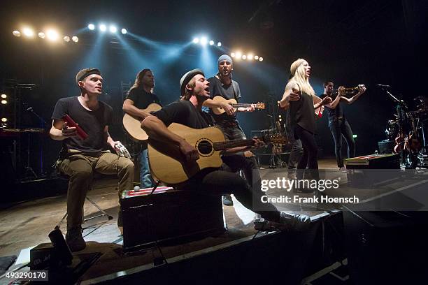 Members of the Canadian band Walk off the Earth perform live during a concert at the Huxleys on October 18, 2015 in Berlin, Germany.