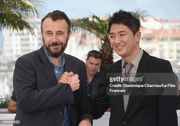 Directors Frederic Cavaye and Chang attend the "The Target" photocall at the 67th Annual Cannes Film Festival on May 23, 2014 in Cannes, France.