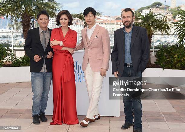 Director Chang, actors Kim Sun Ruoungl and Yu Jun-Sang and director Frederic Cavaye attend the "The Target" photocall at the 67th Annual Cannes Film...