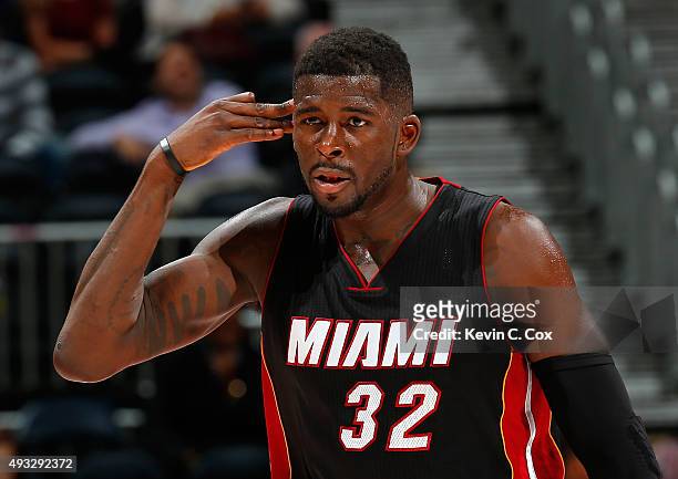 James Ennis of the Miami Heat reacts after hitting a three-point basket against the Atlanta Hawks at Philips Arena on October 18, 2015 in Atlanta,...