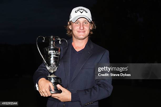 Emiliano Grillo of Argentina celebrates with the trophy after winning in the final round of the Frys.com Open on October 18, 2015 at the North Course...