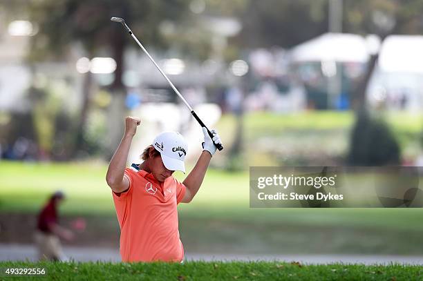 Emiliano Grillo of Argentina celebrates a shot from a bunker on the tenth hole during final round of the Frys.com Open on October 18, 2015 at the...