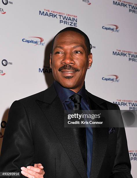 Honoree Eddie Murphy poses on the red carpet during the 18th Annual Mark Twain Prize For Humor at The John F. Kennedy Center for Performing Arts on...