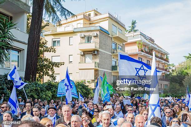 Jewish community bring their flags and shout slogans during a stage protest against the media attacks that just stir up hatred towards Israel.