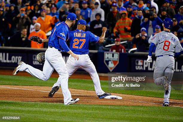 Jeurys Familia of the New York Mets tags out Chris Coghlan of the Chicago Cubs for the final out to defeat the Chicago Cubs in game two of the 2015...