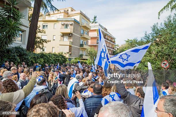 Jewish community bring their flags and shout slogans during a stage protest against the media attacks that just stir up hatred towards Israel.