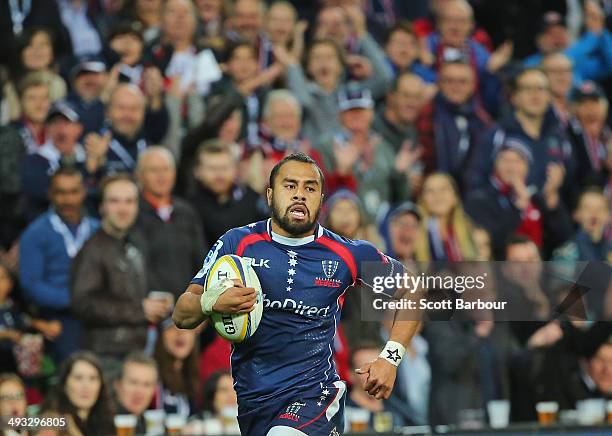 Telusa Veainu of the Rebels runs away to score a try during the round 15 Super Rugby match between the Rebels and the Waratahs at AAMI Park on May...