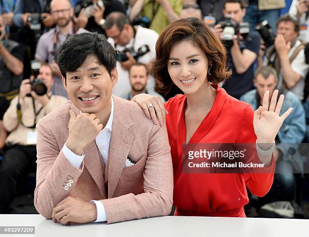 Actors Yu Jun-Sang and Kim Sun Ruoungl attend the "Pyo Jeok" Photocall during the 67th Annual Cannes Film Festival on May 23, 2014 in Cannes, France.