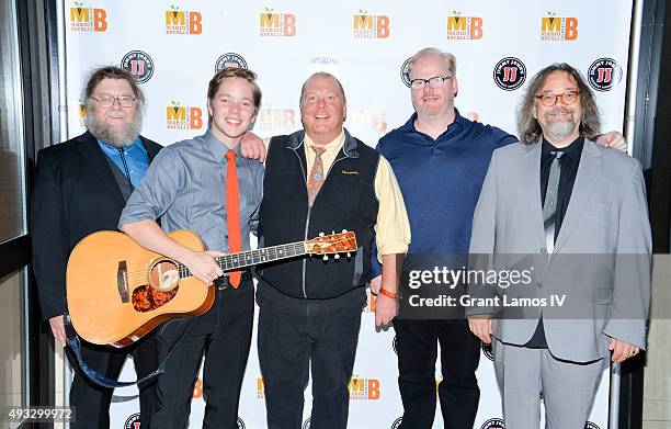 Mario Batali with Billy Strings and band attend the 4th Annual Mario Batali Foundation dinner honoring Gretchen Witt at Del Posto Ristorante on...