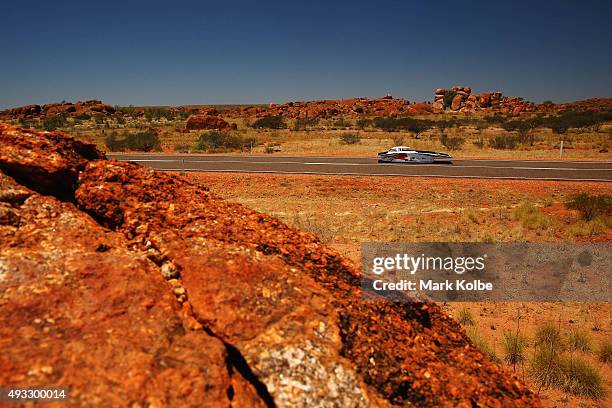 Nuna8 of Nuon Solar Team Netherlands passes through Karlu Karlu as it races in the Challenger Class during day two of the 2015 World Solar Challenge...