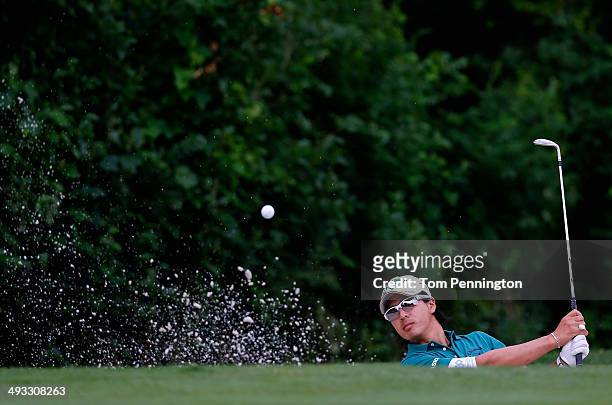 Ryo Ishikawa of Japan plays his shot out of the bunker on the 11th during Round Two of the Crowne Plaza Invitational at Colonial on May 23, 2014 at...