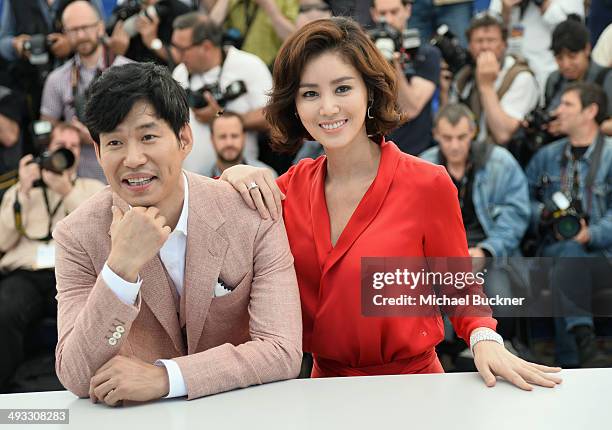 Actors Yu Jun-Sang and Kim Sun Ruoungl attend the "Pyo Jeok" Photocall during the 67th Annual Cannes Film Festival on May 23, 2014 in Cannes, France.