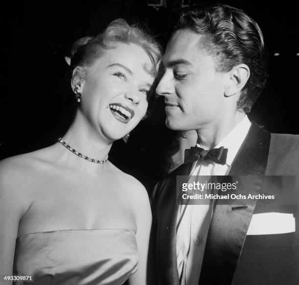 Actress Anne Francis and husband Bam Price attend the premier of " The Robe" in Los Angeles, California.