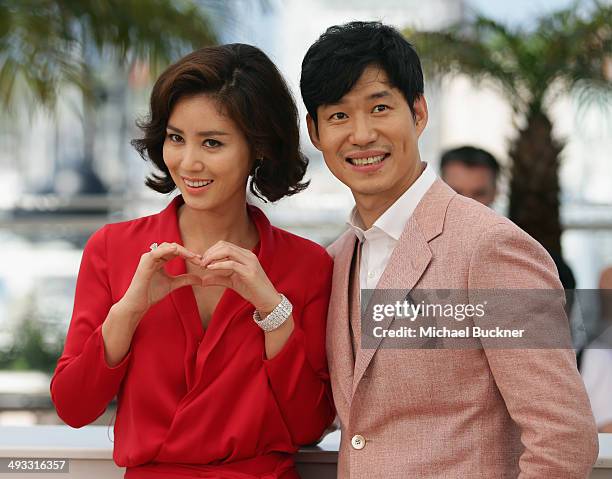 Actors Yu Jun-Sang and Kim Sun Ruoungl attend the "Pyo Jeok" Photocall during the 67th Annual Cannes Film Festival on May 23, 2014 in Cannes, France.