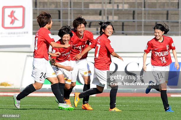 Kana Osafune of Urawa Reds Ladies celebrates scoring her team's first goal with her team mates during the Nadeshiko League match between Urawa Red...