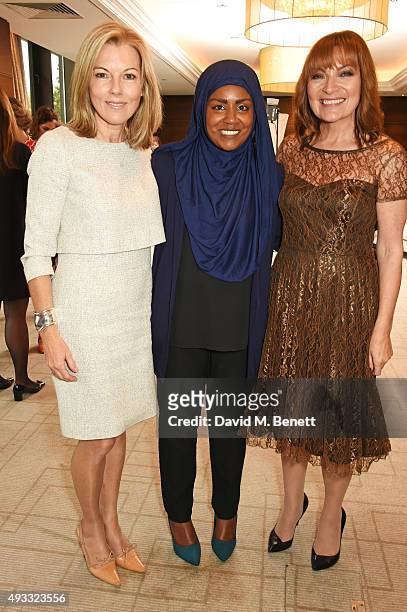 Mary Nightingale, Great British Bake Off winner Nadiya Hussain and Lorraine Kelly attend the Women of the Year lunch and awards at the...