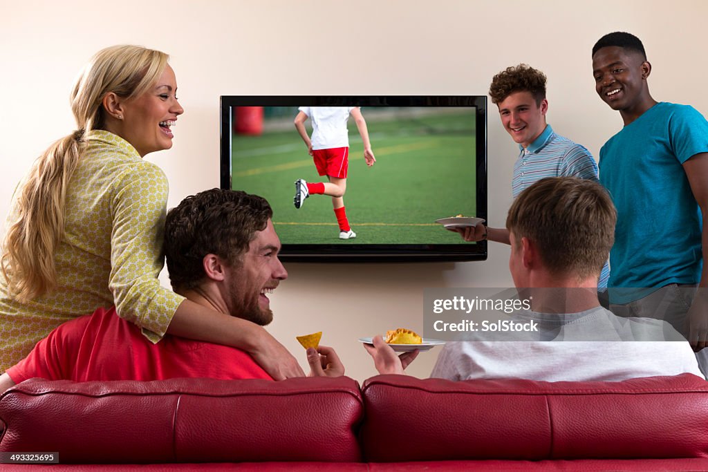 Group of Friends Watching Sports on TV