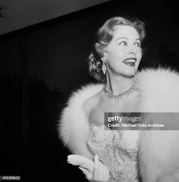 Actress Arlene Dahl arrives at a party in Los Angeles, California.