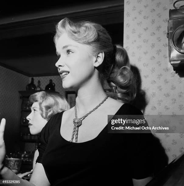 Actress Anne Francis attend a party in Los Angeles, California.