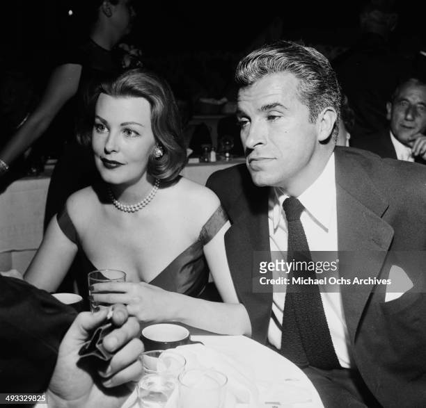 Actress Arlene Dahl and actor Fernando Lamas attend a dinner in Los Angeles, California.