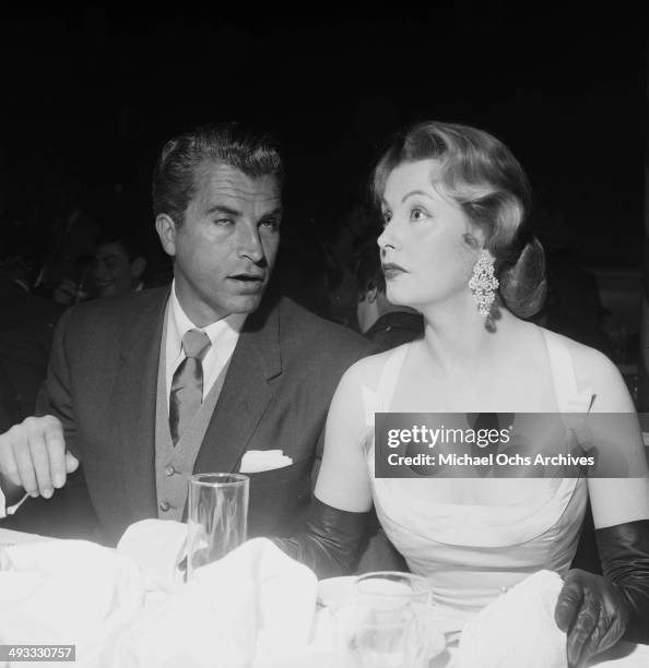 Actress Arlene Dahl and actor Fernando Lamas attend a dinner in Los Angeles, California.