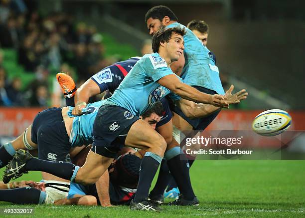 Nick Phipps of the Waratahs passes the ball during the round 15 Super Rugby match between the Rebels and the Waratahs at AAMI Park on May 23, 2014 in...