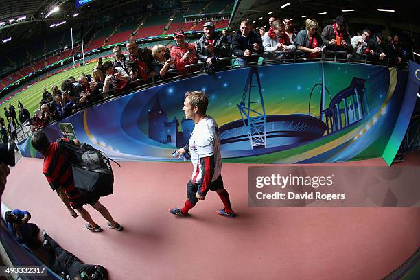 Jonny Wilkinson, the Toulon captain, walks down the tunnel as Toulon fans look on during the Toulon kicking practice held at the Millennium Stadium...