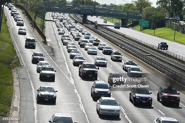 Traffic jams up on the Kennedy Expressway leaving the city while inbound traffic remains light as motorists hit the road for the start of the...