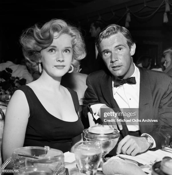 Actress Anne Francis and John Lupton attend a party in Los Angeles, California.