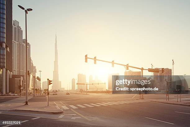 dubai burj khalifa sunrise - dubai fog stock pictures, royalty-free photos & images