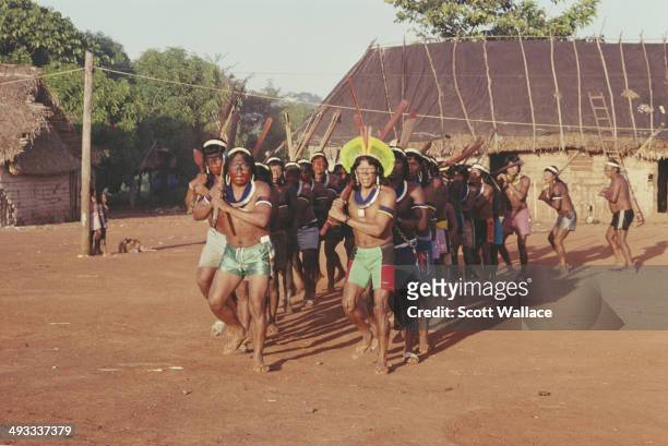 Paulinho Paiakan , a leader of the Kayapo people, takes part in a war dance in the Amazon Basin, Brazil, 1992.