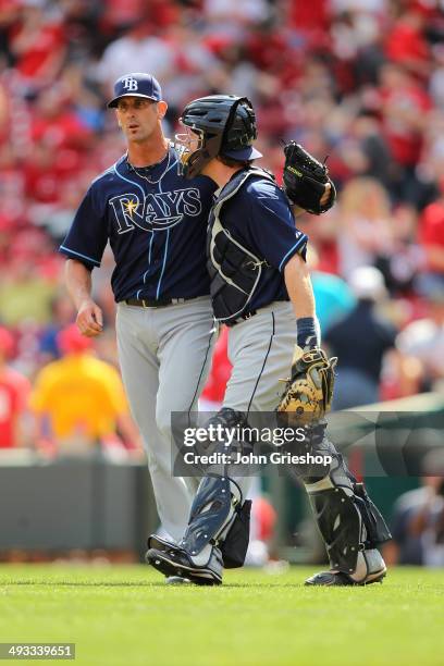 Grant Balfour and Ryan Hanigan of the Tampa Bay Rays celebrate defeating the Cincinnati Reds at Great American Ball Park on Saturday, April 12, 2014...