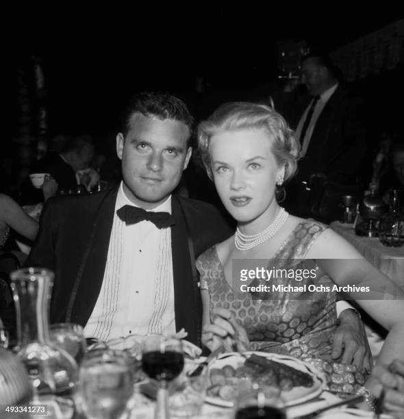 Actress Anne Francis and Buddy Bregman attend the re-opening of Coconut Grove in Los Angeles, California.