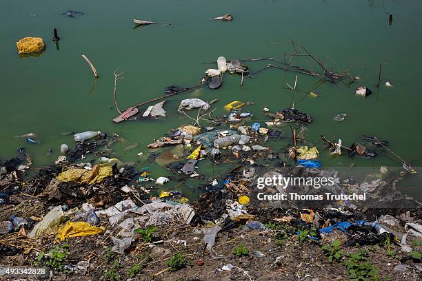 Beira, Mozambique Waste floating in a river on September 28, 2015 in Beira, Mozambique.