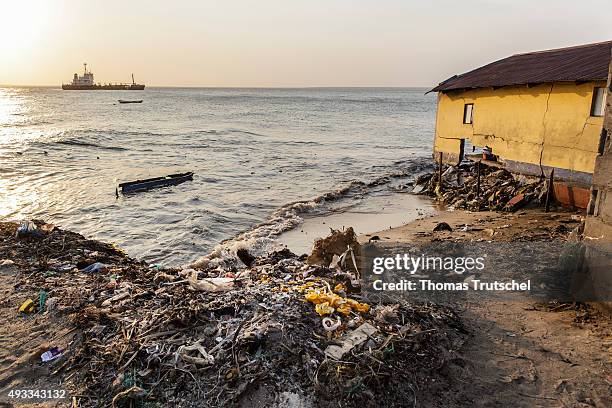 Beira, Mozambique Stranded garbage on the beach in Beira on September 28, 2015 in Beira, Mozambique.