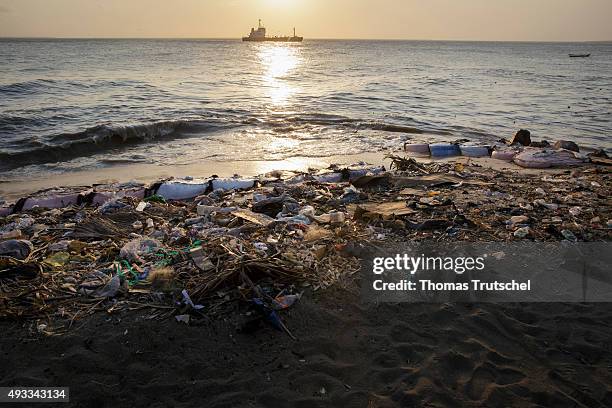 Beira, Mozambique Stranded garbage on the beach in Beira on September 28, 2015 in Beira, Mozambique.