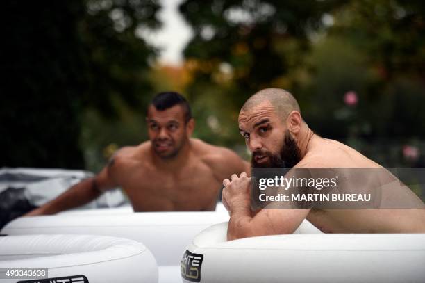 Australia's fly half Kurtley Beale and Australia's lock Scott Fardy attend a team recovery session in Teddington, west London, on October 19, 2015...