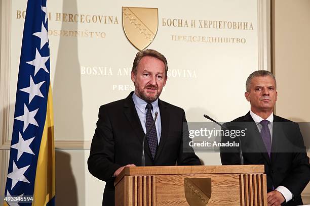 Leader of Party of Democratic Action Bakir Izetbegovic delivers a speech during a press conference after he signed a coalition agreement with Leader...