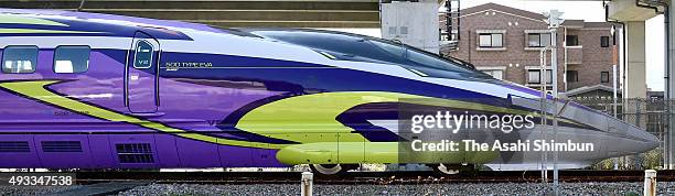 An exterior view of the head coach of the popular animation series 'Neon Genesis Evangelion' themed Shinkansen bullet train '500 Type Eva' is seen at...