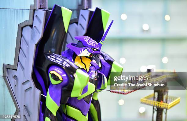 Miniature models are displayed in the head coach of the popular animation series 'Neon Genesis Evangelion' themed Shinkansen bullet train '500 Type...