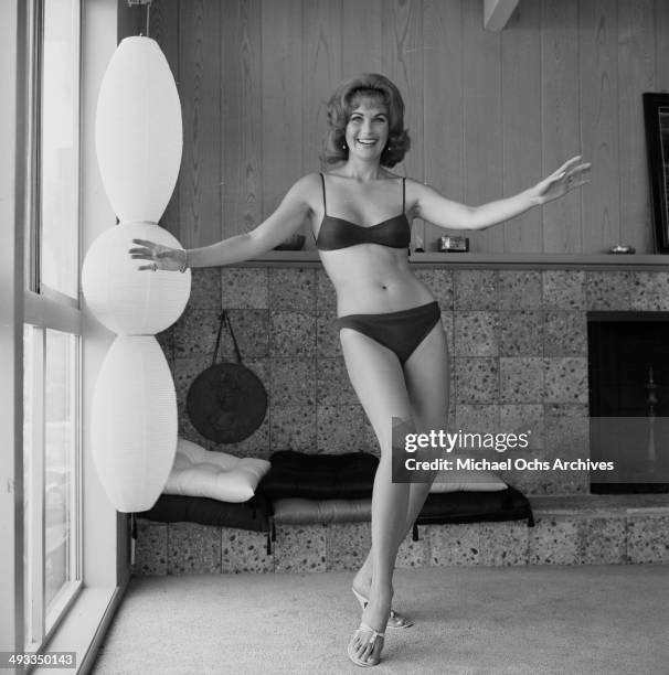 Actress Barbara Hines poses at home in Los Angeles, California.