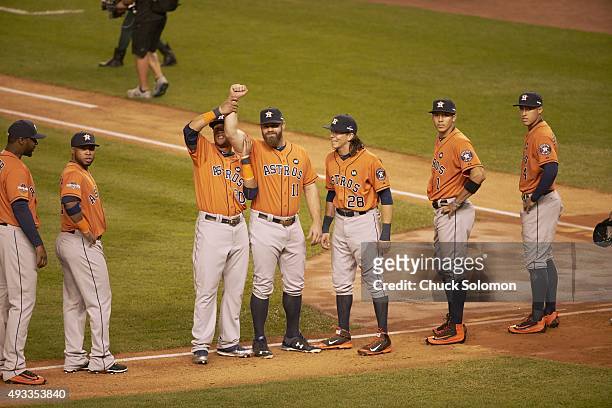 Wild Card Game: Houston Astros Carlos Gomez holding up Evan Gattis arm during introductions before game vs New York Yankees at Yankee Stadium. Bronx,...