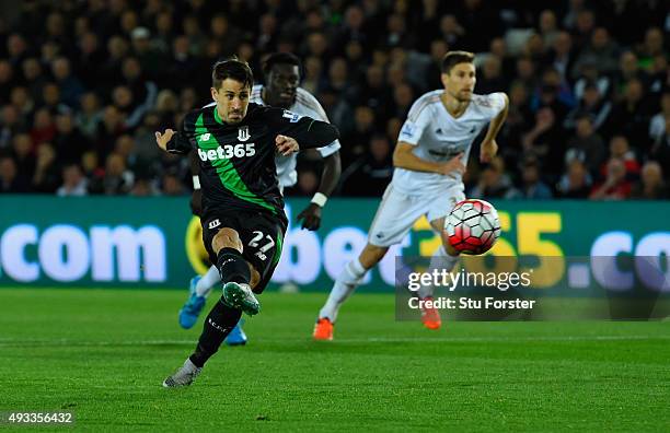 Bojan Krkic of Stoke City scores their first goal from the penalty spot during the Barclays Premier League match between Swansea City and Stoke City...