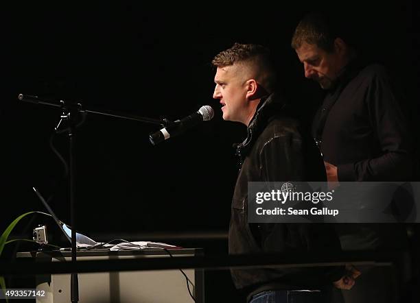 Tommy Robinson of the English Defense League speaks to supporters of the Pegida movement gathered on the first anniversary since the first Pegida...