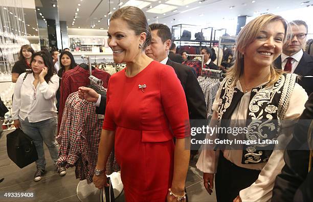 Crown Princess Victoria of Sweden smiles during a visit to H&M store at Jockey Plaza on October 19, 2015 in Lima, Peru.