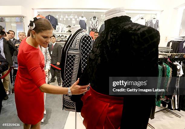 Crown Princess Victoria of Sweden visit a H&M store at Jockey Plaza on October 19, 2015 in Lima, Peru.